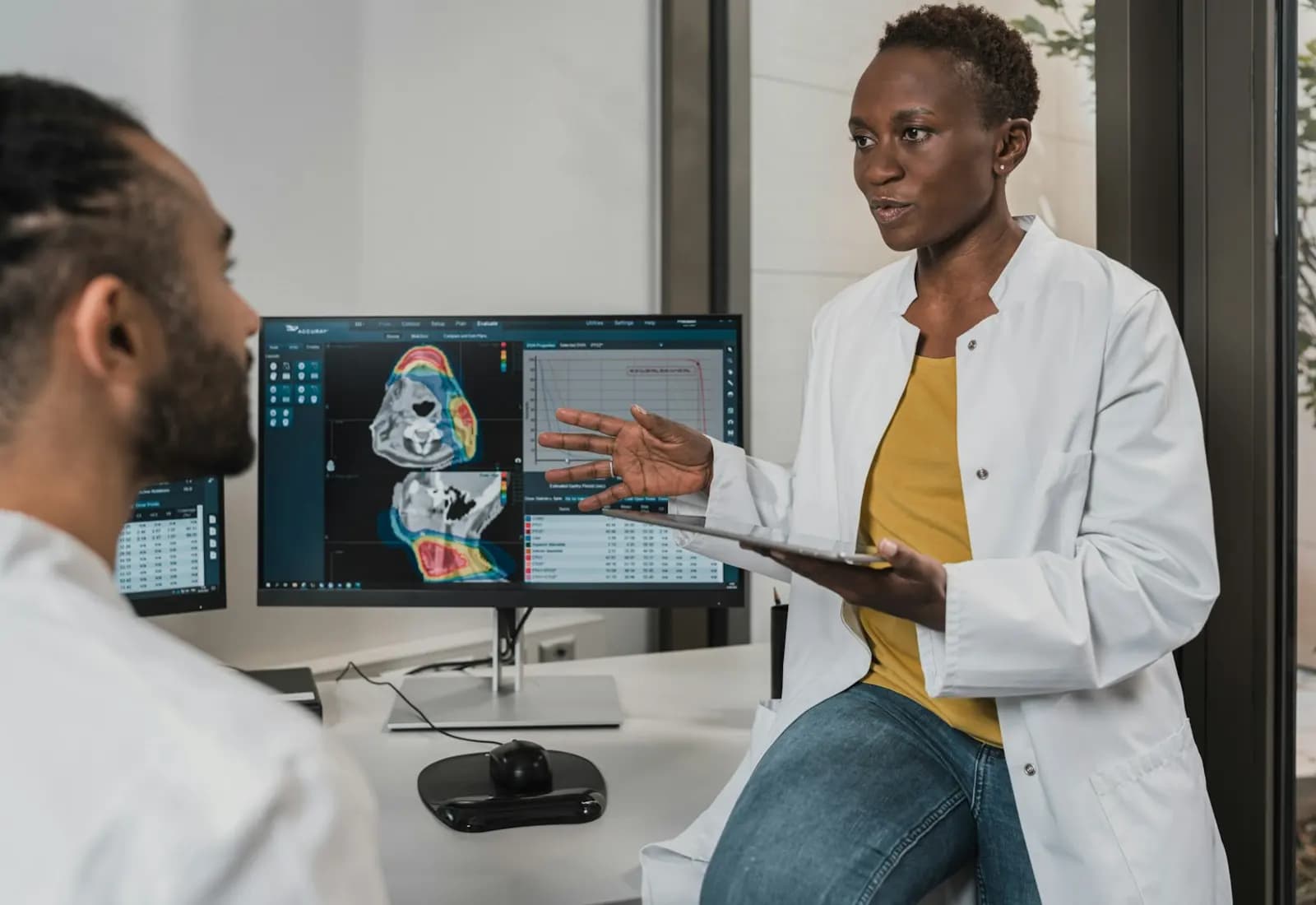 A healthcare consultation in a clinical setting
